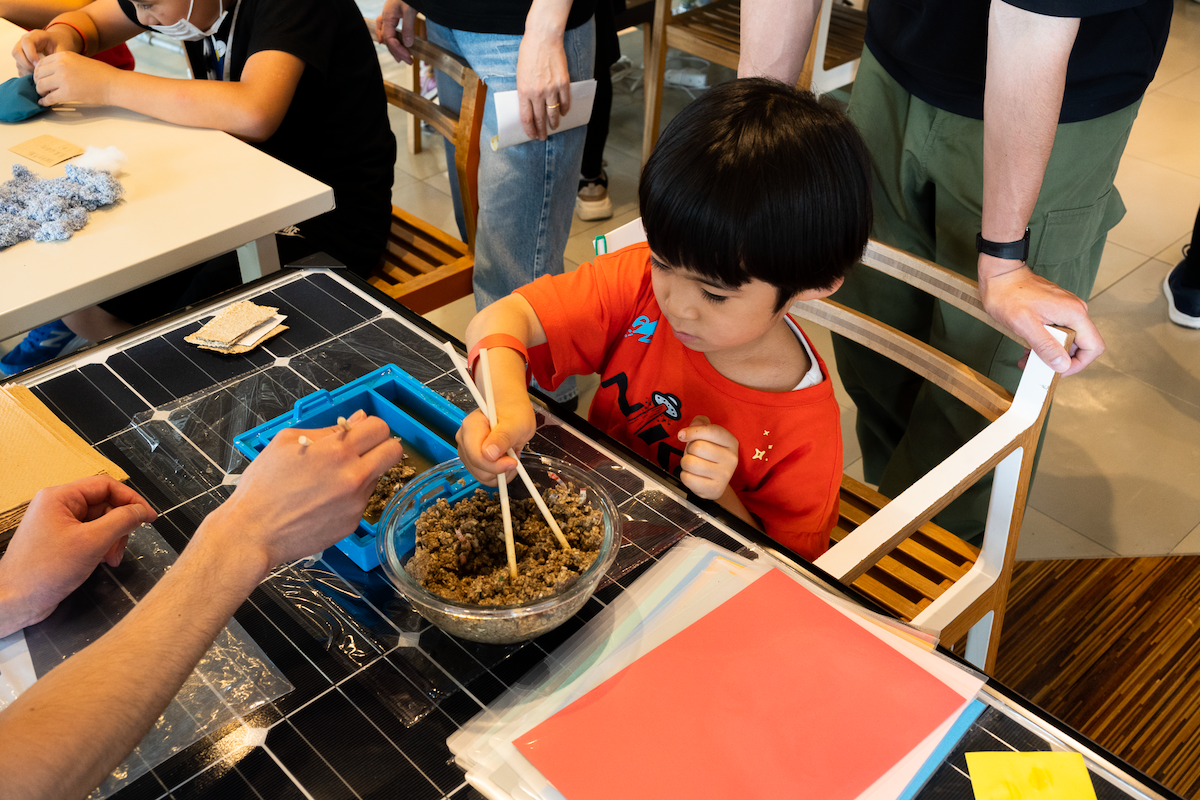 Children engaging with materials